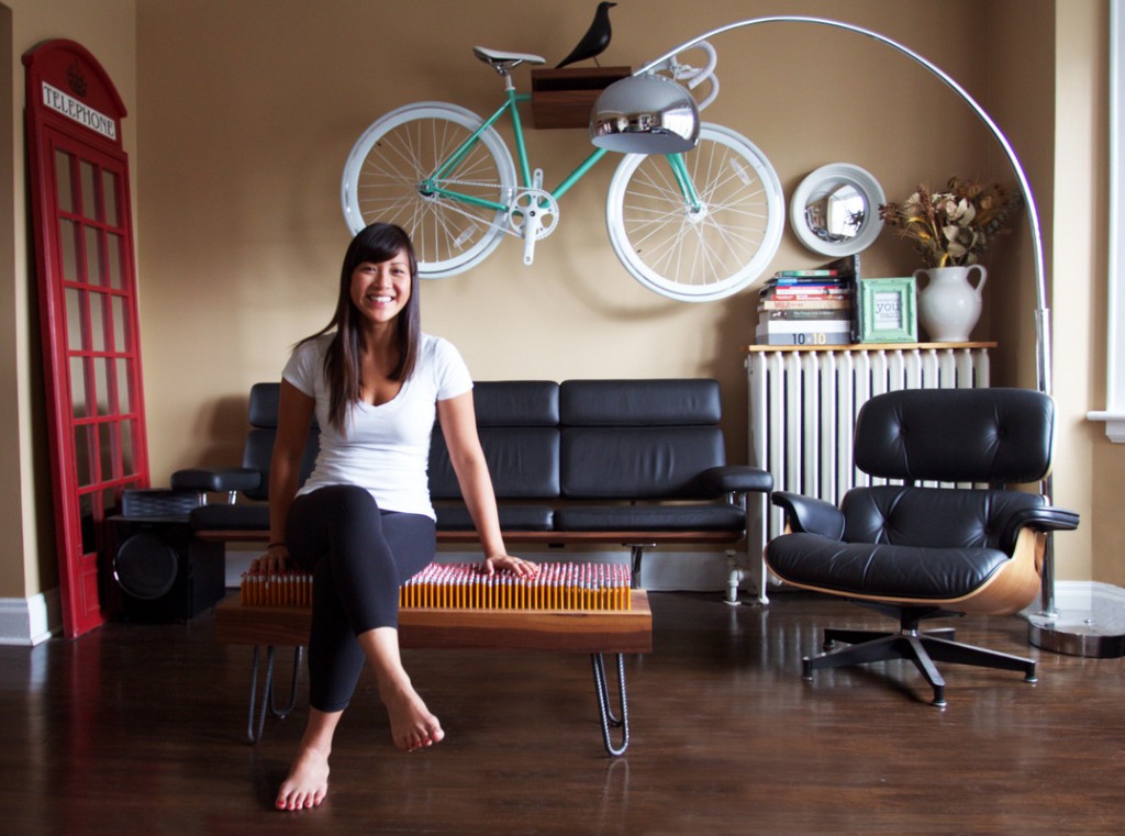 kim ho sitting on her walnut pencil bench with hairpin bench legs