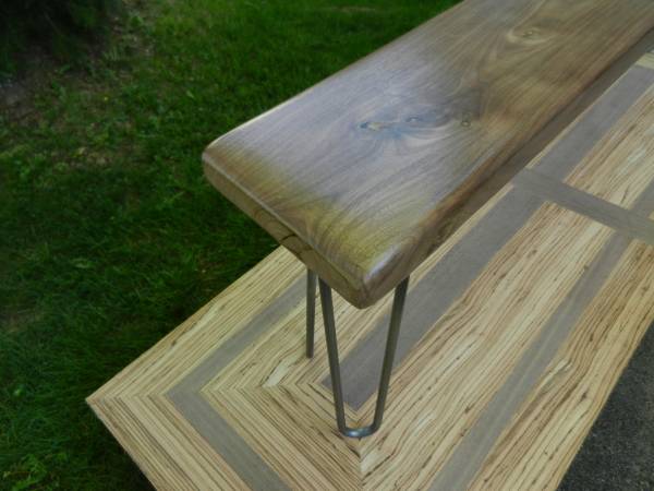 rounded walnut bench with hairpin legs