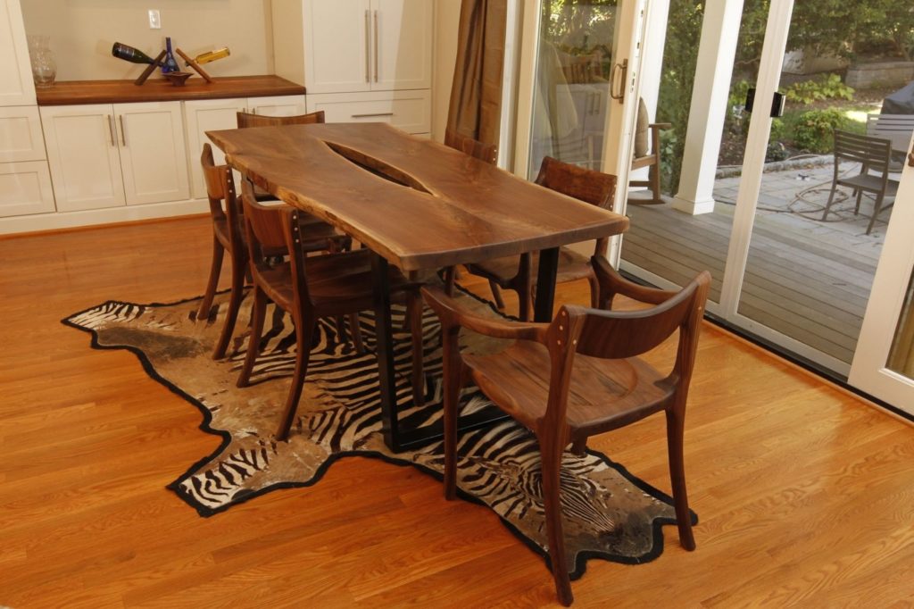 wood and carbon fiber table with custom metal legs