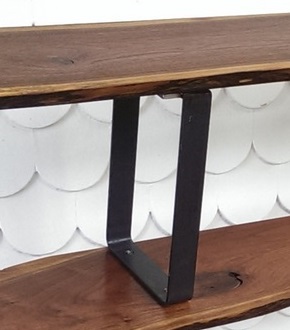 closeup flat bar bookshelf with custom metal legs