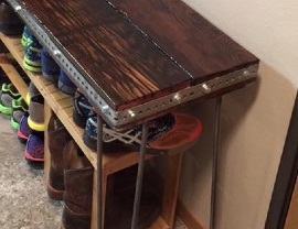 entryway table with water tower wood and hairpin legs closeup