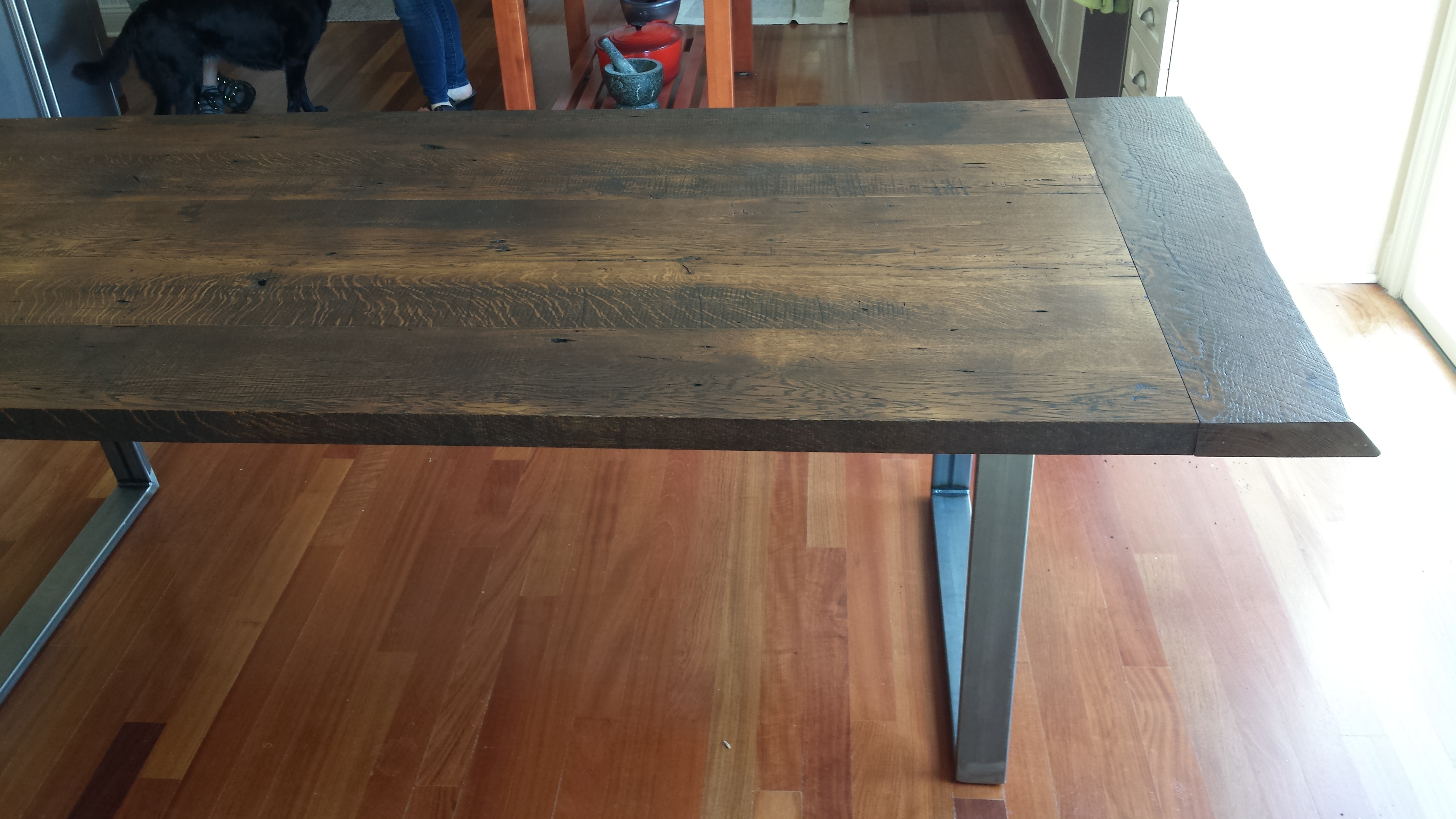 closeup reclaimed table with custom bench legs